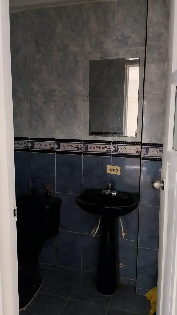 4 Ciudad 2000 casa venta baño atrás del garaje.webp